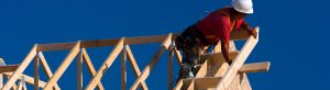 Man building roof